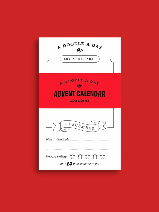 Odd Goose Creative Advent Calendar A Doodle A Day notepad seen top down with red paper band wrap