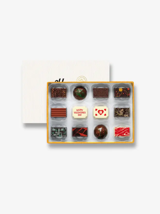 A box of 12 luxury chocolates with special Valentine's Day designs