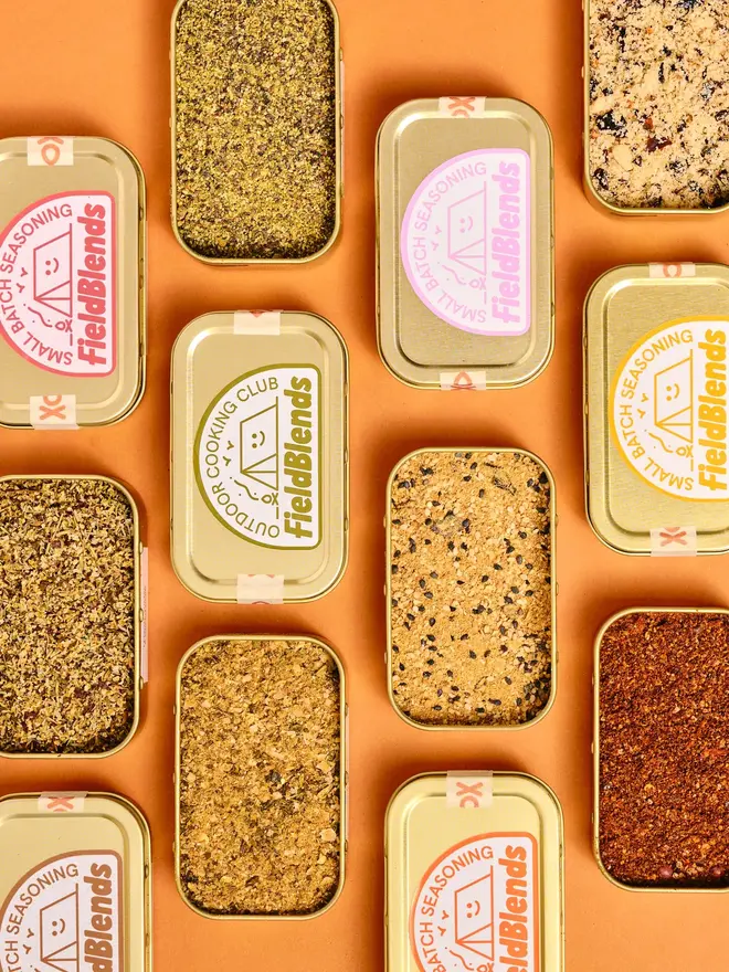 Blend Big Bundle (Pack Of 6), all tins grouped together with lids off showing herbs. 