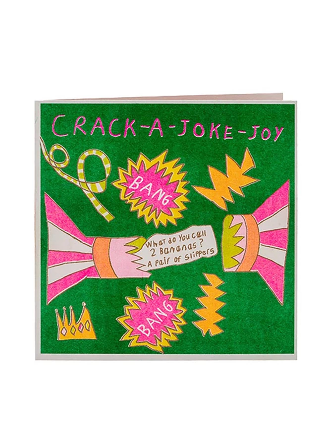A handmade vibrant riso printed Christmas Holiday Greeting card, Crack a joke joy