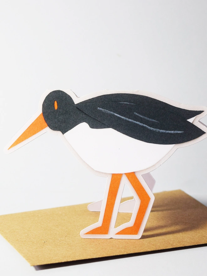 A cut out card of an oystercatcher