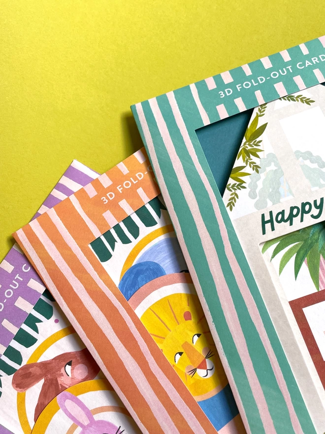 Each card has a beautifully painted striped wallet in either lilac, mint or sunshine yellow. Keeping both the card and envelope inside protected