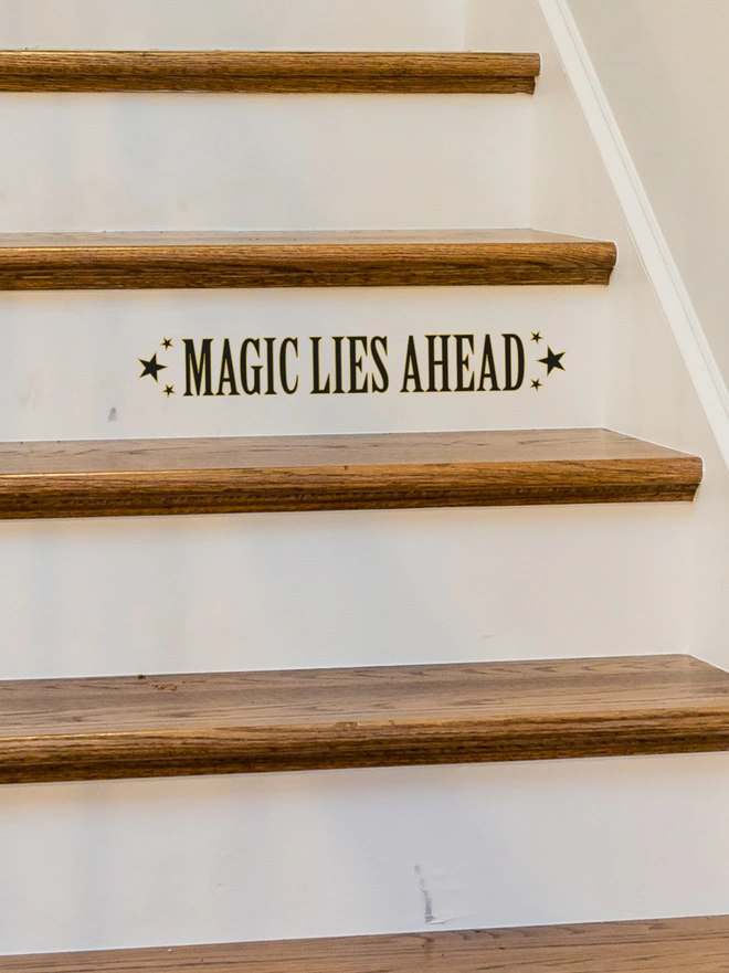 Magic Lies Ahead wall and mirror sticker by Joanie and Jeanie – black lettering decal ideal for teenage bedroom décor and Halloween.