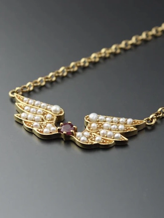 Ramona Necklace - Seed Pearl Wings with Ruby Centre Regular price