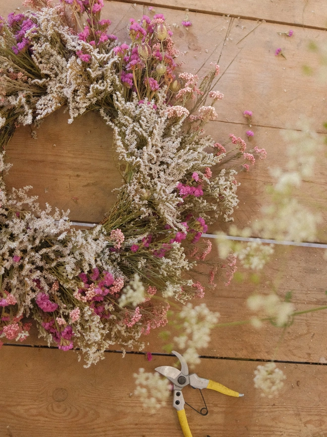 brown and pink dried flower wreath