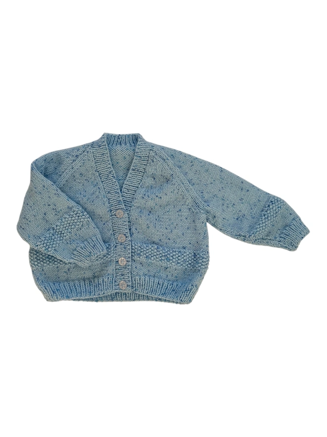 blank knitted cardigan on white backdrop