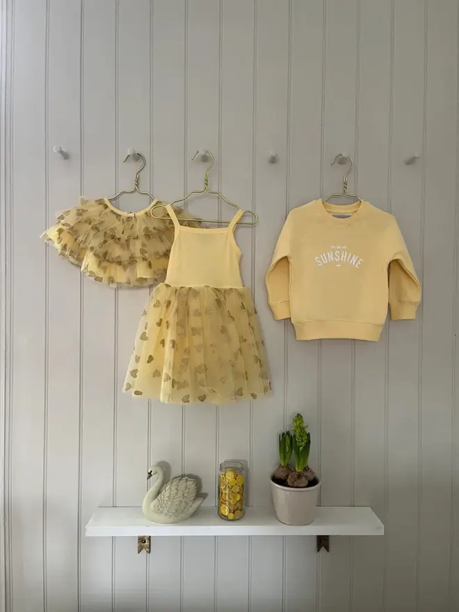 Butter Yellow ' You Are My Sunshine' Sweatshirt paired with a butter yellow and glitter dress and cape 
