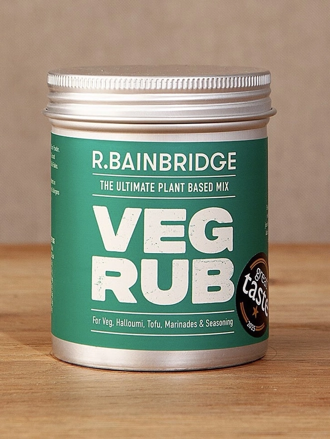 Veg Rub (Set Of 1, 2 Or 3), a seasoning sitting on a wooden surface against a plain backdrop. 