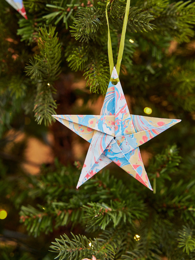 Hand marbled star decoration