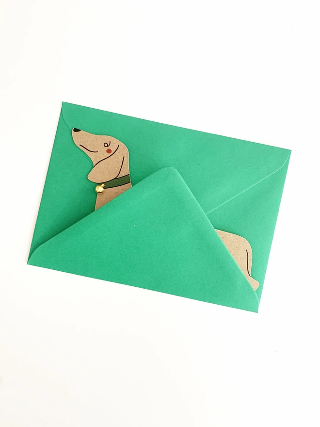 Dachshund dog shaped card with a gold bell By kitty kenda papergoods 