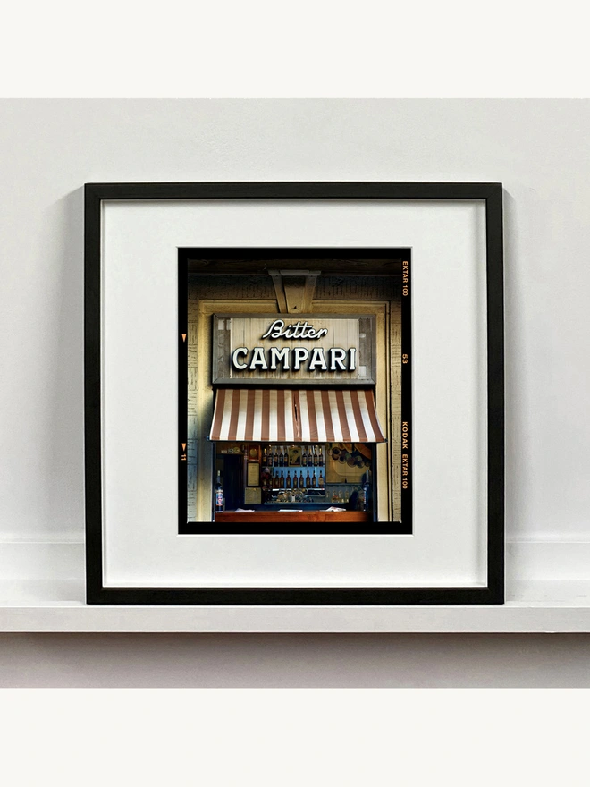 Bitter Campari mounted square framed in black