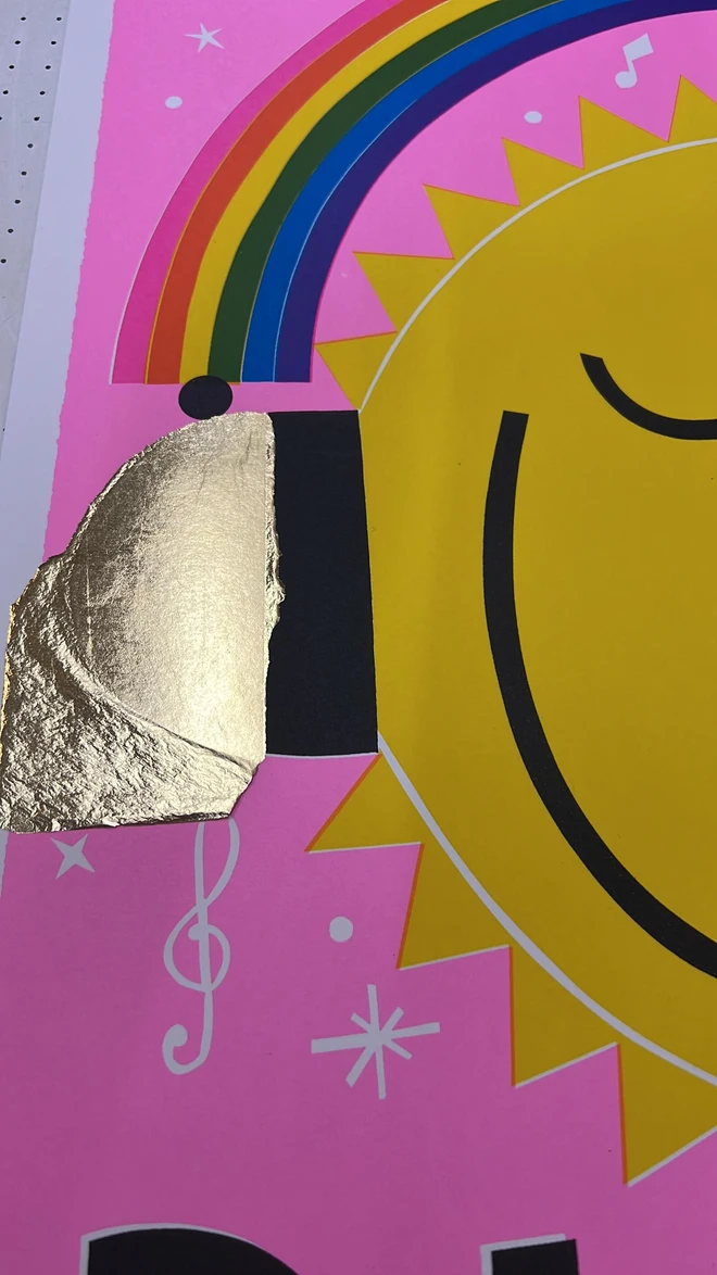 'Happy Place' Screenprint, a colourful screenprint. The print says 'Happy place' and shows an image of a sun under a rainbow. 