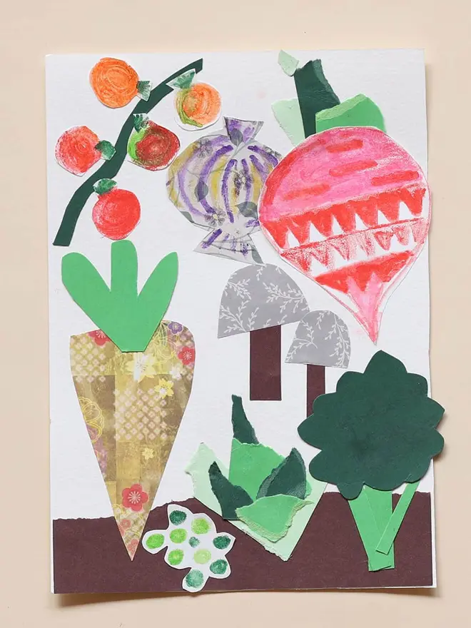in the garden mini activity box for children. drawn and coloured vegetables on paper.
