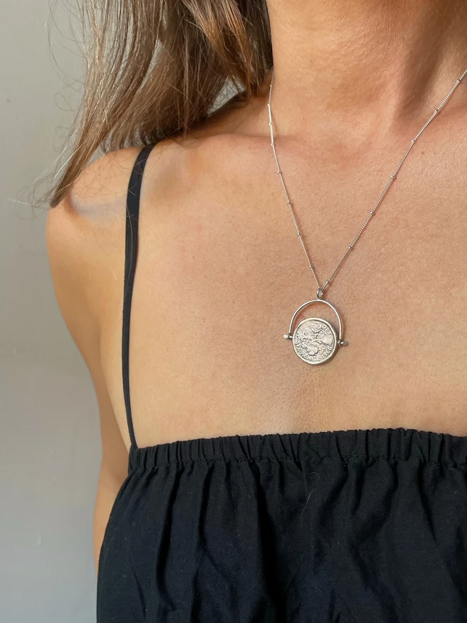 The lucky British sixpence coin is traditionally given as a symbol of love, luck and prosperity. This necklace is a nod to tradition with a cheeky twist, the solid sterling silver penny spins round and on the reverse is engraved 'make your own luck'. A perfect gift for those who are about to embark on a new chapter of life, or a new adventure! I'm a firm believer that we make our own luck, that we get out what we put in... but lets be honest, a little extra help wouldn't hurt, right?! Wear it, gift it, or bribe the universe with it! Made by Celina C Jewellery, a small business in the UK, find on Holly and Co.