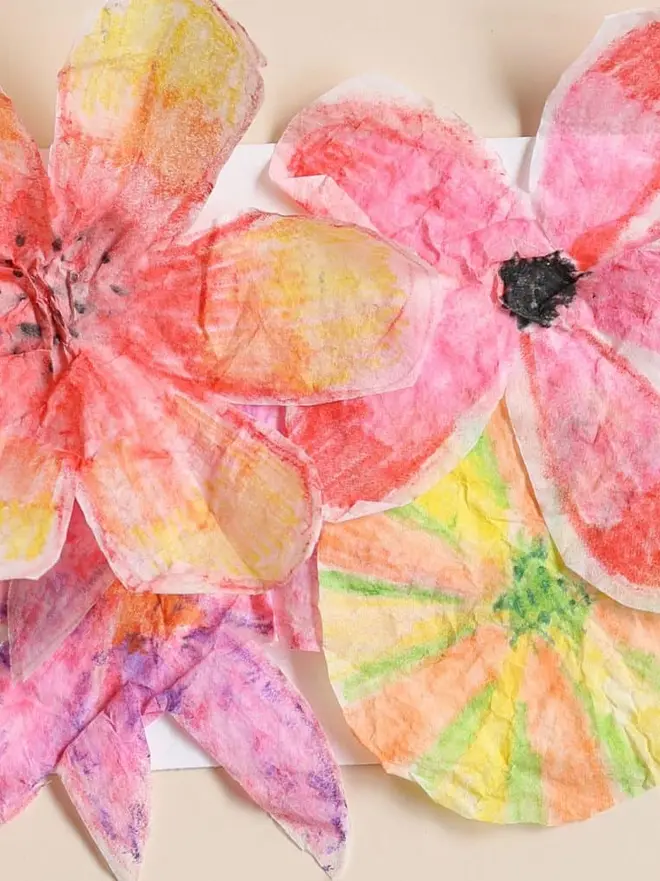 in the garden mini activity box for children. a collection of drawn and coloured flowers.