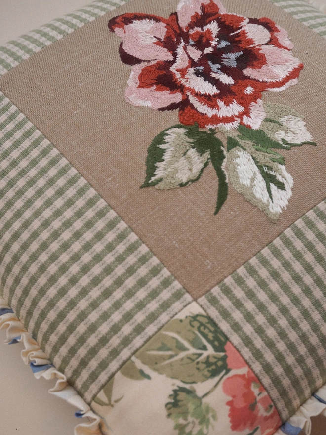 Close up Rosa Embroidered ruffle cushion