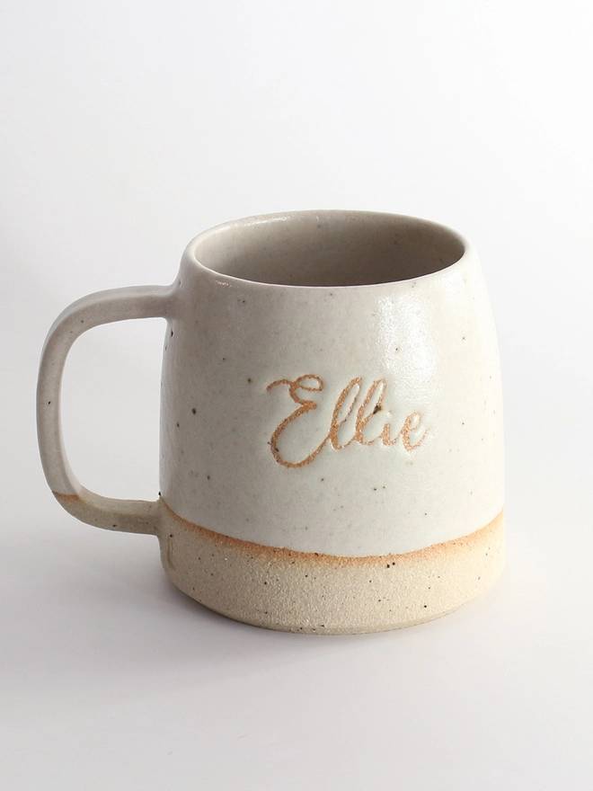 Handmade ceramic stoneware mug featuring the name Ellie.