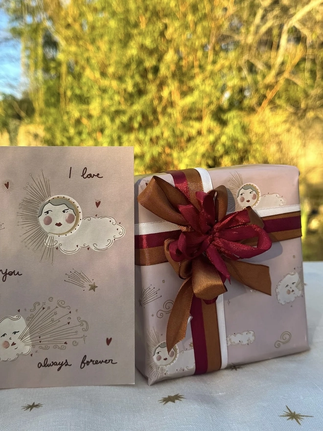 Always Forever Gift Wrap (3 Sheets), a gift wrapped in the wrapping paper. 