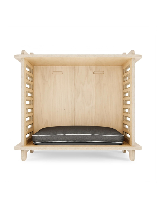 wooden dog crate interior with cushion