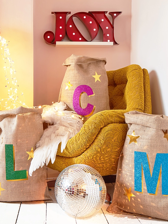 Personalised 3D initial Christmas sacks in various colours with disco ball and joy sign