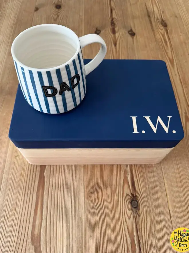 personalised hand-painted initials box. a wooden box with a painted blue lid and initials.