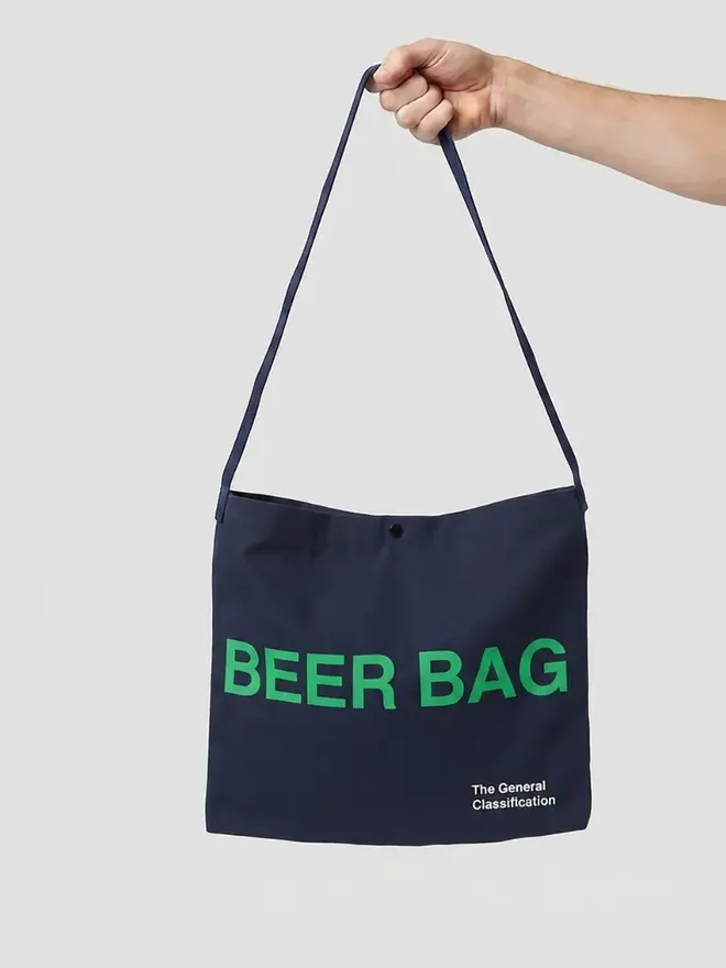 'Beer Bag' Musette Bag, against a grey background. 