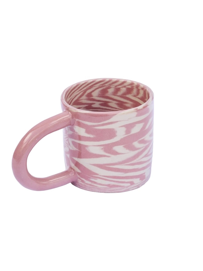 Herringbone Chunky Mug, a colourful mug sitting on a white surface against a plain backdrop. 