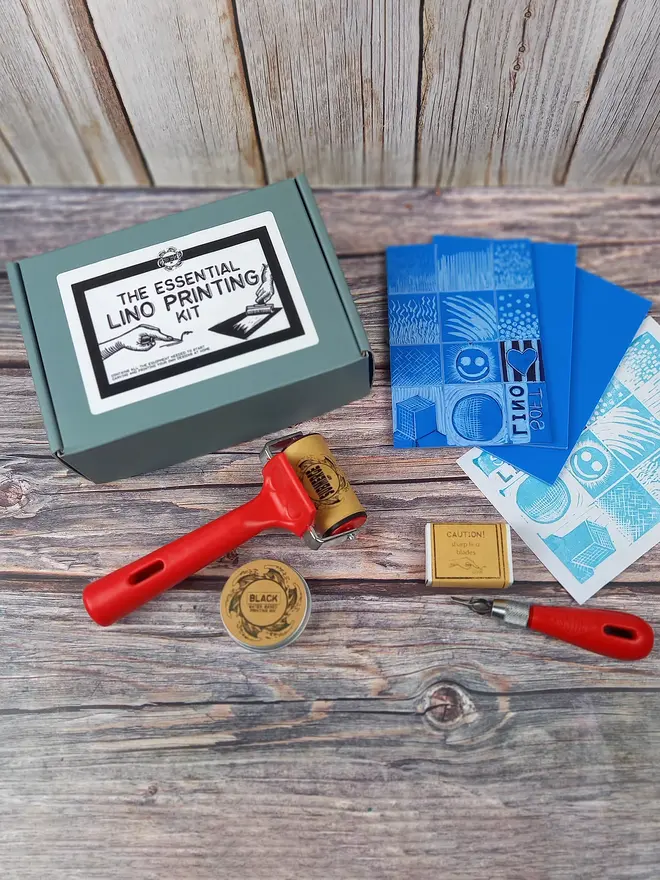 Essentials lino stamp carving and printing kit showing sample carving