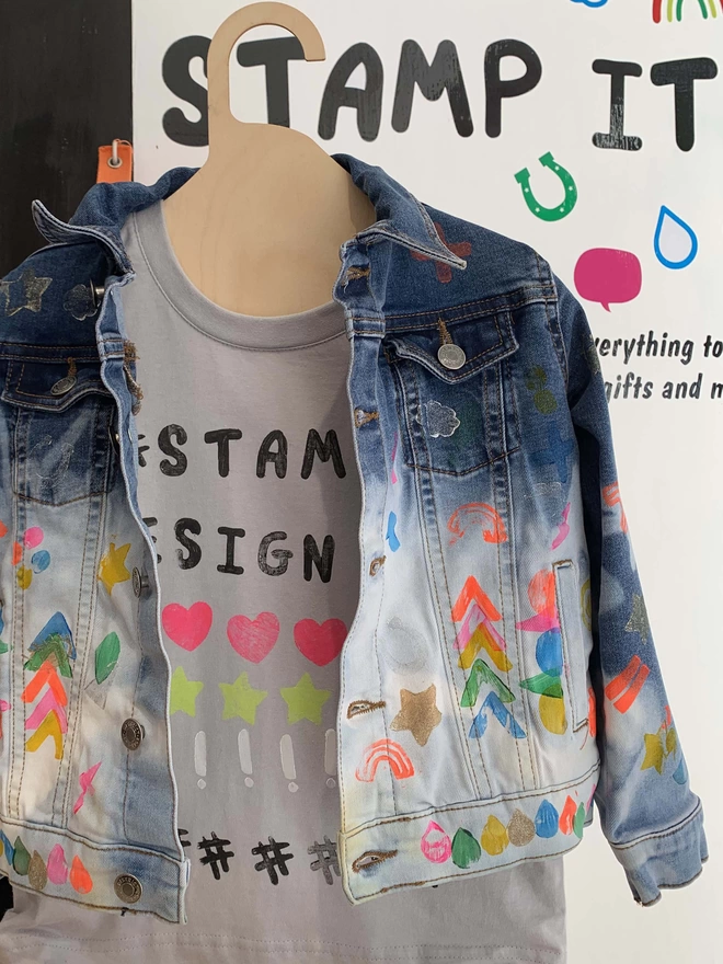 Upcycled denim jacket with coloured stamps 