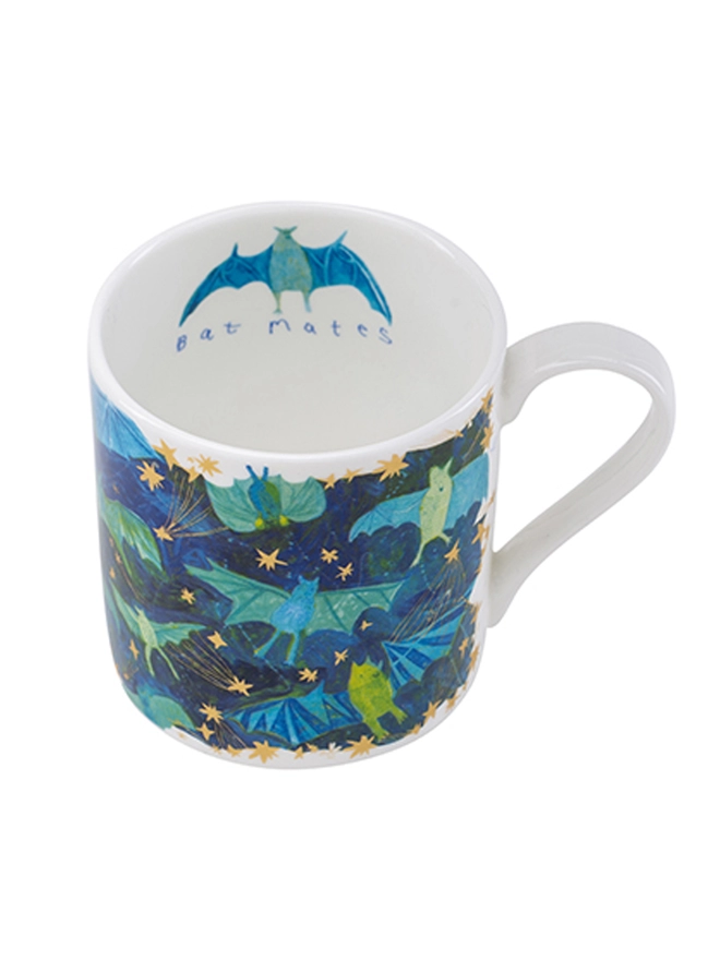 close up shot of bats fine bone china charity gift mug featuring gold, green & blue illustrations