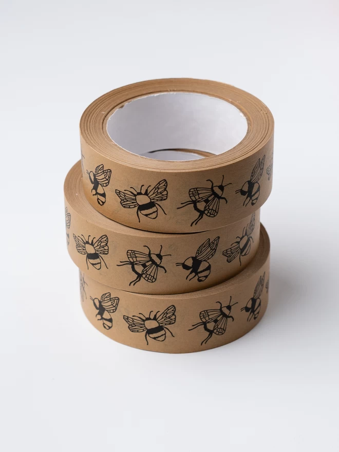 Three rolls of bumblebee kraft paper tape in a stack