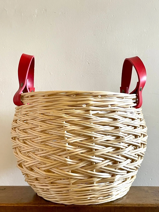 white round willow basket storage basketry one of a kind natural handcrafted red handles