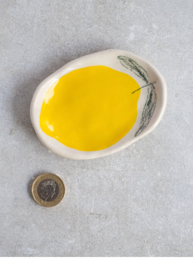 Wee Dishes. A dish with a lemon design.