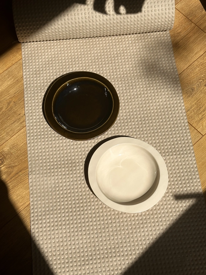 two round serving bowls