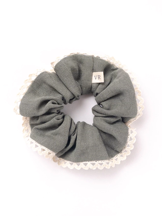 Vanessa Rose Hair scrunchie in sage green linen with lace edge