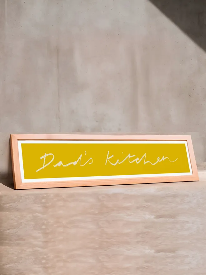 'Dad's Kitchen' in yellow