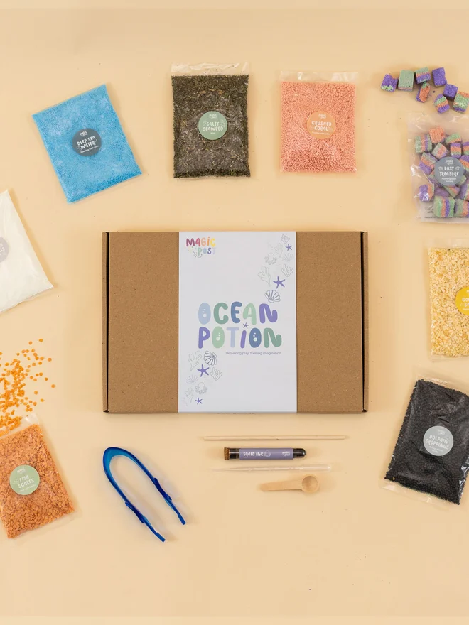 ocean potion children's sensory set. nine bags of various sensory materials packaged and placed in a cardboard box.