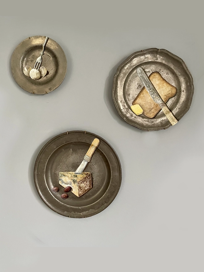 pewter plates on wall