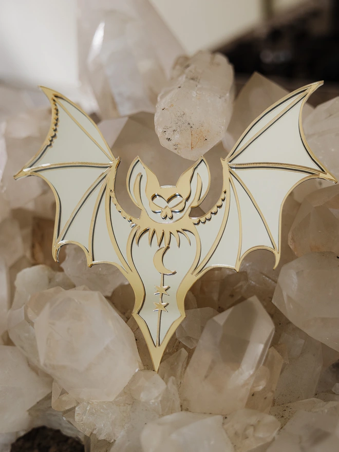 Silver and gold bat wall mirror