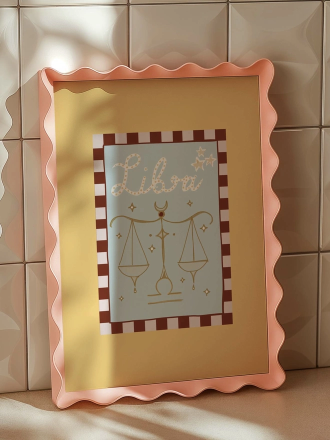 Libra Print in wavy frame. Unique and decorative print. Yellow with a pink and maroon boarder with Libra illustration inside.Digital print horoscope print A3 A4 A5 