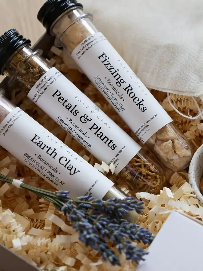 Natural bath time ingredients in a fun potion kit designed for mixing and playing in the bath. 