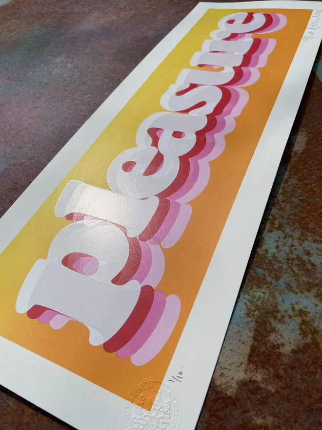 "Pleasure" Colour Blend Screen Print fading from orange to yellow with the word pleasure printed on top indifferent shades of pink and white 