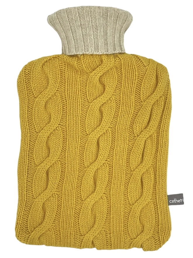 Cashmere Hot Water Bottle Cover, a colourful water bottle sitting on a white plain surface. 