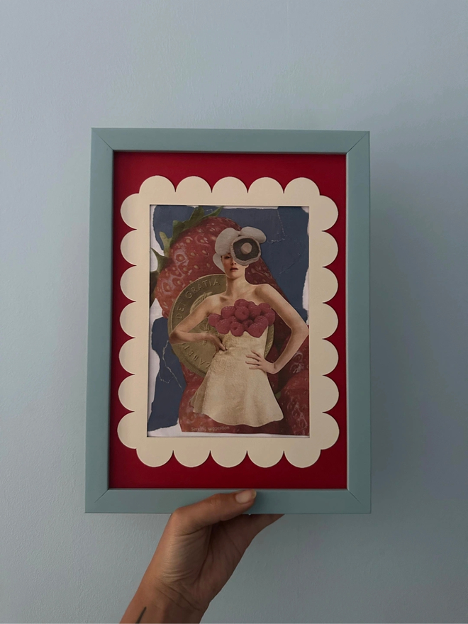 Scallop Edged A5 / A4 photo mount. red mount in blue frame held against grey background.