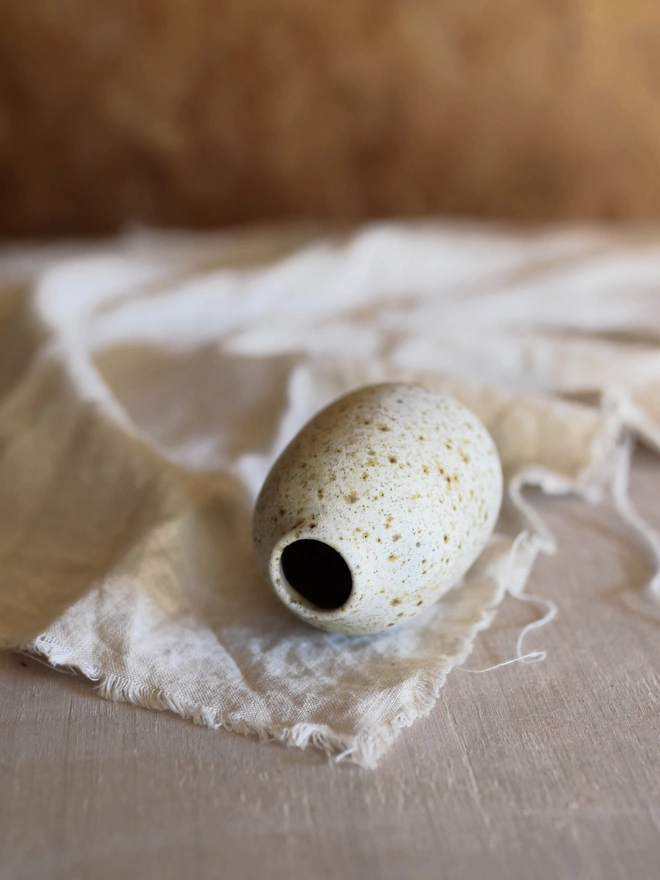 Stoneware bud vase. A small stoneware handmade bud vase with a speckled glaze