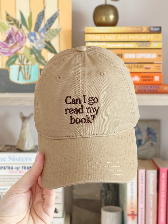'Can I Go Read My Book?' Cotton Baseball Cap beige being held