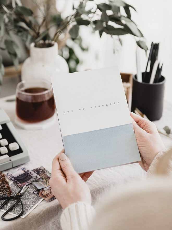 Soft grey and white 'thoughts' journal