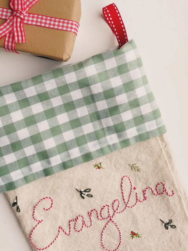 Hand embroidered Christmas stocking with the name Evangelina