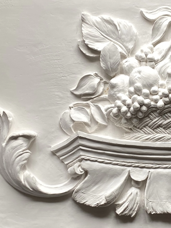 Detail of plaster of Paris bas-relief wall plaque with Still Life design