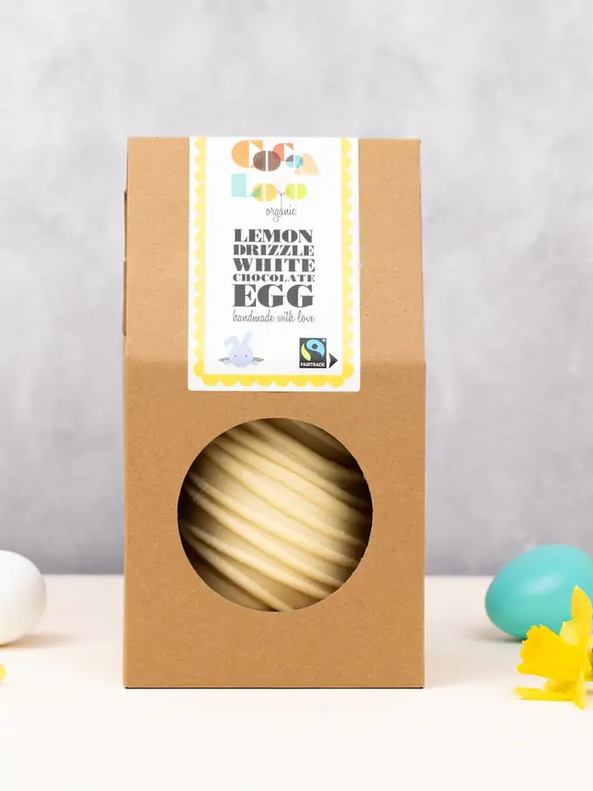 lemon drizzle egg on a table in a brown box